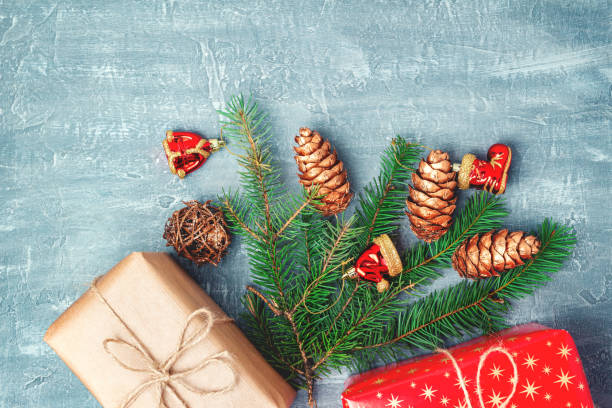 istock Christmas or New Year background with decorations, pine branch and gift boxes, top view with copy space 1178029007