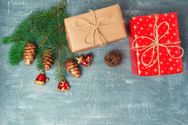istock Christmas or New Year background with decorations, pine branch and gift boxes, top view with copy space 1178029215