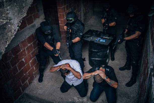 istock SWAT team arresting gangsters 1178029273