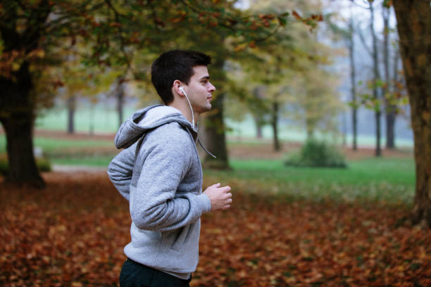 istock Autumn run in the park 1178030680