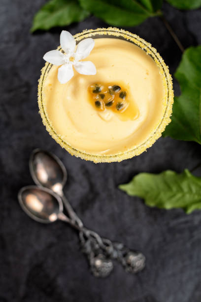 istock Passion fruit mousse on dark background, top vire, vertical composition 1178031803