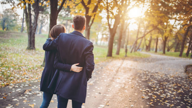 istock Young couple in a park 1178034638