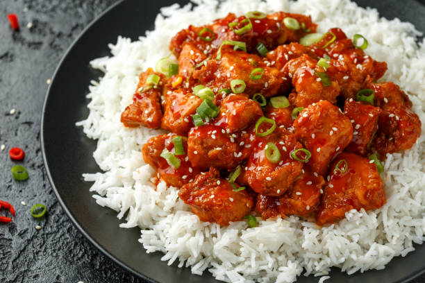 istock Tso's chicken with rice, green onion and broccoli 1178035424