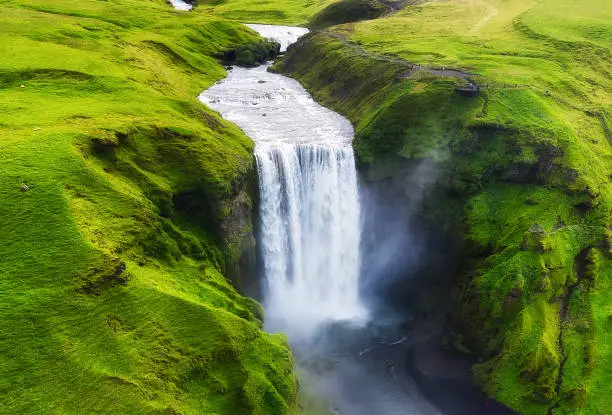 Photo of Aerial view on the Skogafoss waterfall in Iceland. Landscape from air. Famous place in Iceland. Travel - image