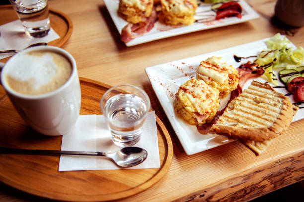 istock breakfast with scrambled eggs, toasts, juice and coffee 1178036685
