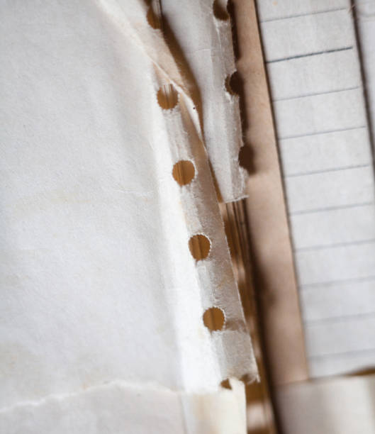 istock Old paper with punched holes 1178036985