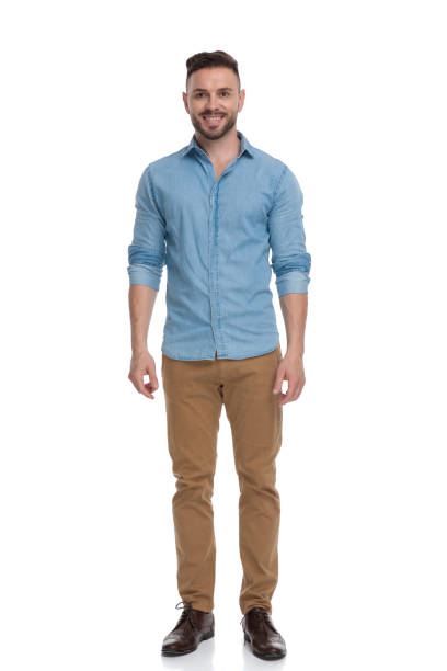 istock casual man standing and looking ahead happy 1178038069