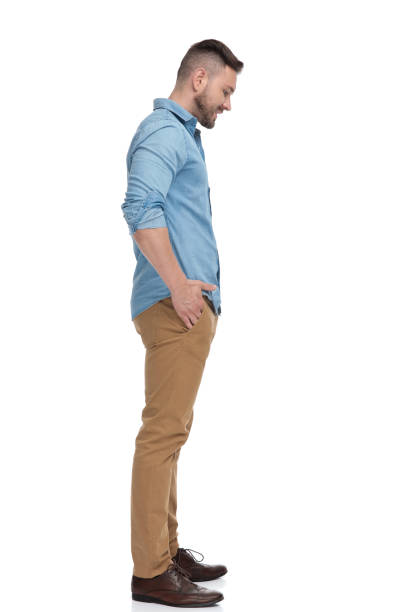istock casual man standing in line looking down sad 1178038173