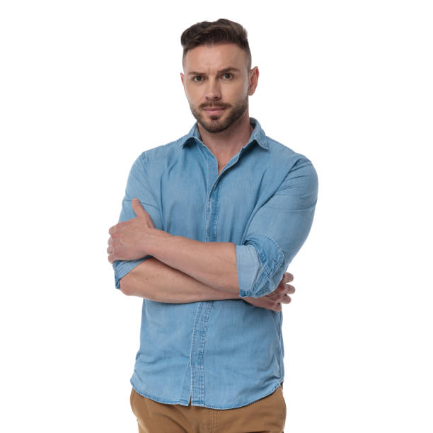 istock casual man standing with arms crossed badass 1178038220