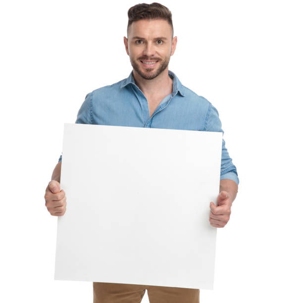 istock casual man standing with billboard on hands happy 1178038285