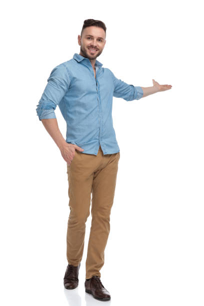 istock fine gentleman walking with hand in pocket greeting happy 1178038428