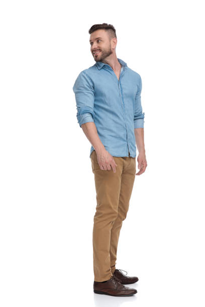istock casual man looking back over shoulder happy 1178038438