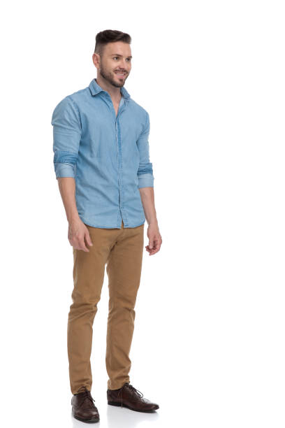 istock casual man standing and looking ahead happy in side view 1178038520