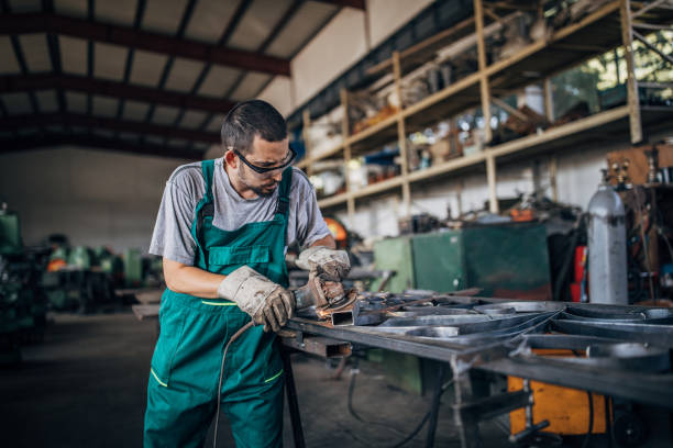istock Man grinding in factory workshop 1178038720