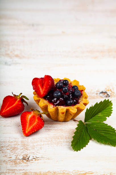istock Small berry cake and and strawberries 1178041903