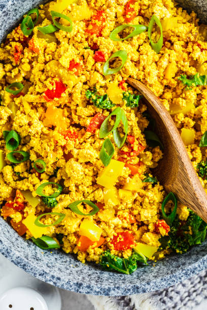 istock Tofu scramble with vegetables in a pan. Vegan Alternative Omelet. 1178043139