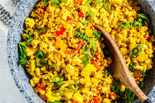 istock Tofu scramble with vegetables in a pan. Vegan Alternative Omelet. 1178043153
