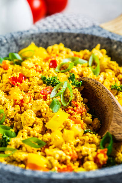 istock Tofu scramble with vegetables in a pan. Vegan Alternative Omelet. 1178043162