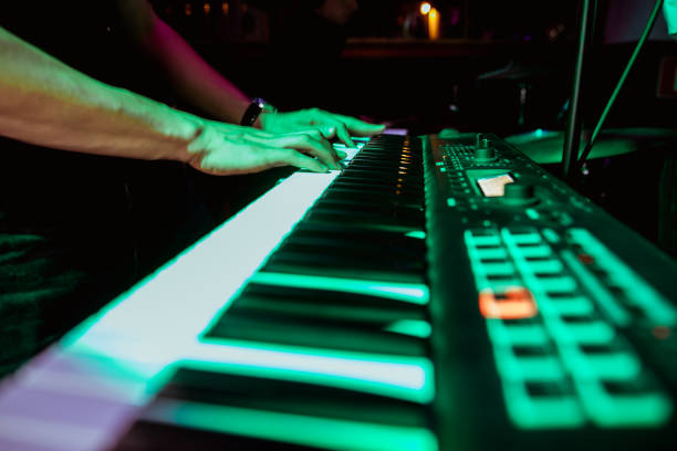 istock playing the synthesizer concert, hands on the keys 1178043370