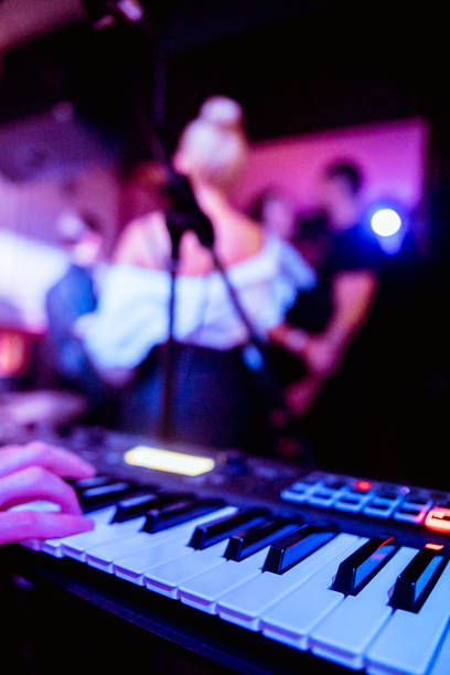 istock playing the synthesizer concert, hands on the keys 1178043404