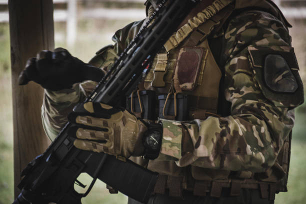istock Military equipment and rifles 1178044624