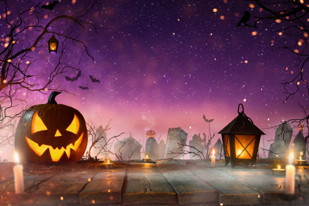 istock Halloween pumpkins on dark spooky forest. 1178046156