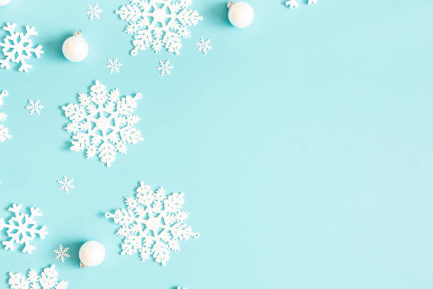 istock Christmas or winter composition. Pattern made of snowflakes on pastel blue background. Christmas, winter, new year concept. Flat lay, top view, copy space 1178049086