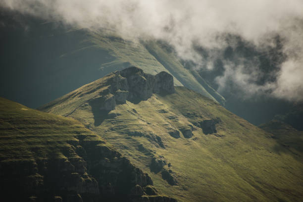 Green mountain landscape with some fog in Cantabria, Spain