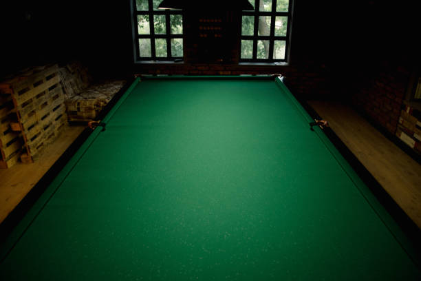 istock Big worn wooden table for russian billiards.Snooker table is empty. 1178051006