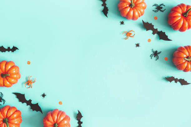 Halloween decorations on blue background. Halloween concept. Flat lay, top view, copy space Halloween decorations on blue background. Halloween concept. Flat lay, top view, copy space vampire photos stock pictures, royalty-free photos & images