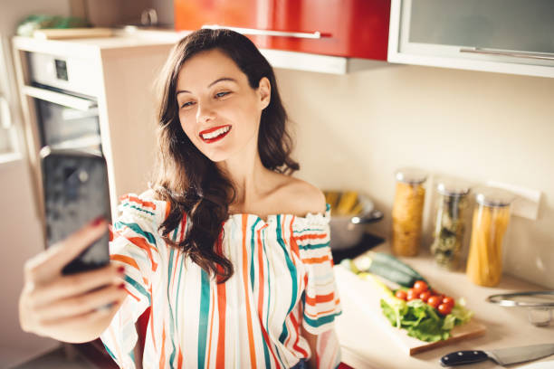 istock Vegan taking a selfie in the kitchen 1178051914