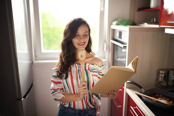 istock Woman thinking about cooking 1178054144