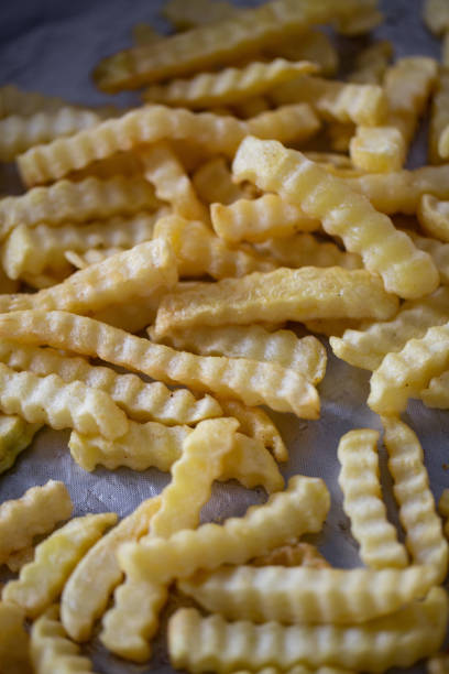 istock French fries. junk food concept 1178061031