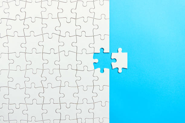 istock Last piece of white puzzle to complete a mission 1178061125
