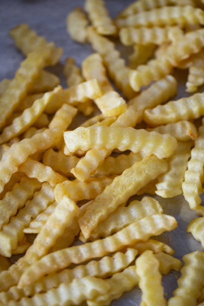 istock French fries. junk food concept 1178061126