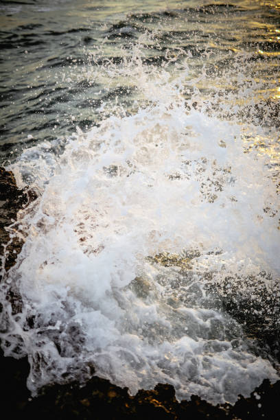 seascape, storm at sea, white waves crashing against the shore, Baltic Sea coast, Latvia, summer