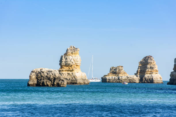 istock Cliffs and rocky caves on Dona Ana beach in Lagoa, Algarve (Portugal) 1178068061