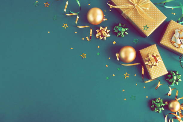 istock Christmas or new year frame decorations in gold colors on dark mint background with empty copy space for text . holiday and celebration concept for postcard or invitation. top view 1178068202