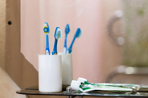 istock Old toothbrushes and toothpaste in the bathroom. 1178068398