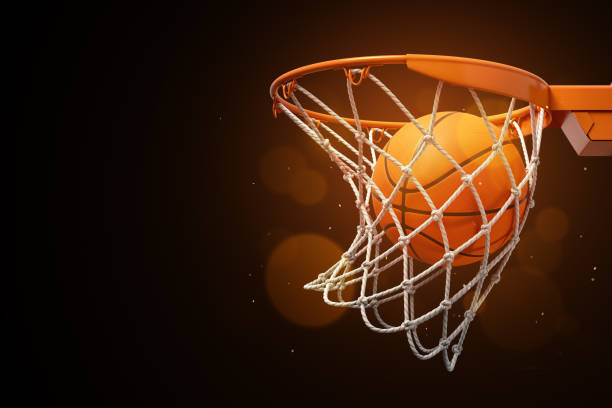 3d-rendering eines basketballs im netz auf dunklem hintergrund. - basketballkorb stock-fotos und bilder