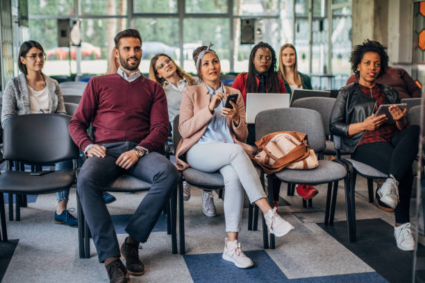 istock Millennial team at board meeting 1178075106