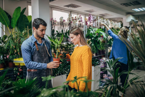 istock Woman at florist 1178076453