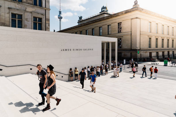 Berlin, Germany - July 27, 2019: Main entrance to James Simon Gallery in Museum Island. Sun flare on background