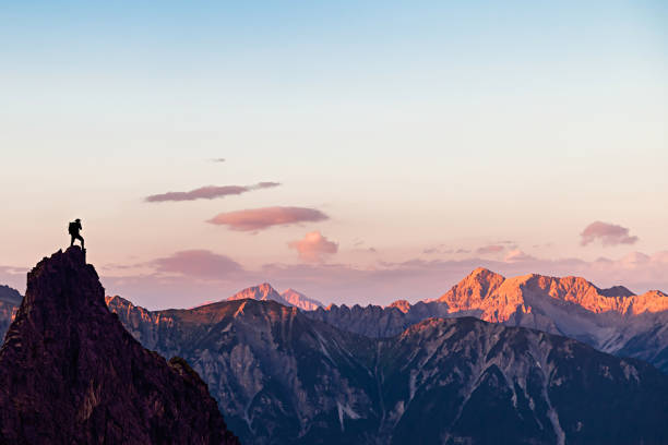 sunset in the mountains - alpenglow imagens e fotografias de stock