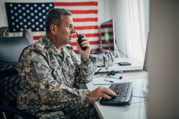 istock Army solider talking on walkie talkie 1178087290