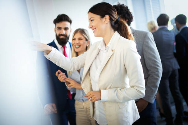 istock Group of business people discussing, brainstorming in office. Concentrated at work. 1178092789