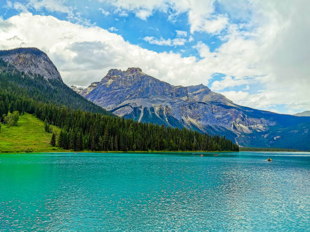 Emerald Lake is located in Yoho National Park, British Columbia, Canada, and it is the largest of 61 lakes and ponds located in this park. It is pictured here with The President and Michael Peak, both part of the President Range of mountains.