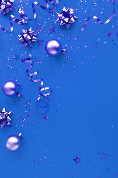 istock christmas or new year decorations on blue background with empty copy space for text. Xmas, holiday and celebration concept for postcard or invitation. top view 1178095332