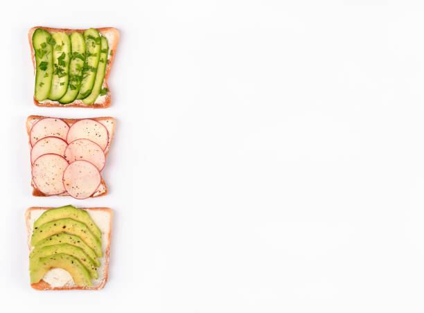 istock Set with toast bread and different toppings on white background, top view 1178095775