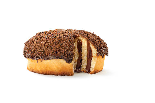 Colomba pasquale with icing, filling and chocolate sprinkles on top.